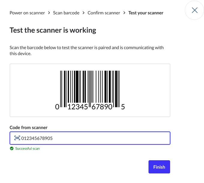 
A 'Test your scanner' pop-up with a barcode in the scanner field and a 'Successful scan' message.