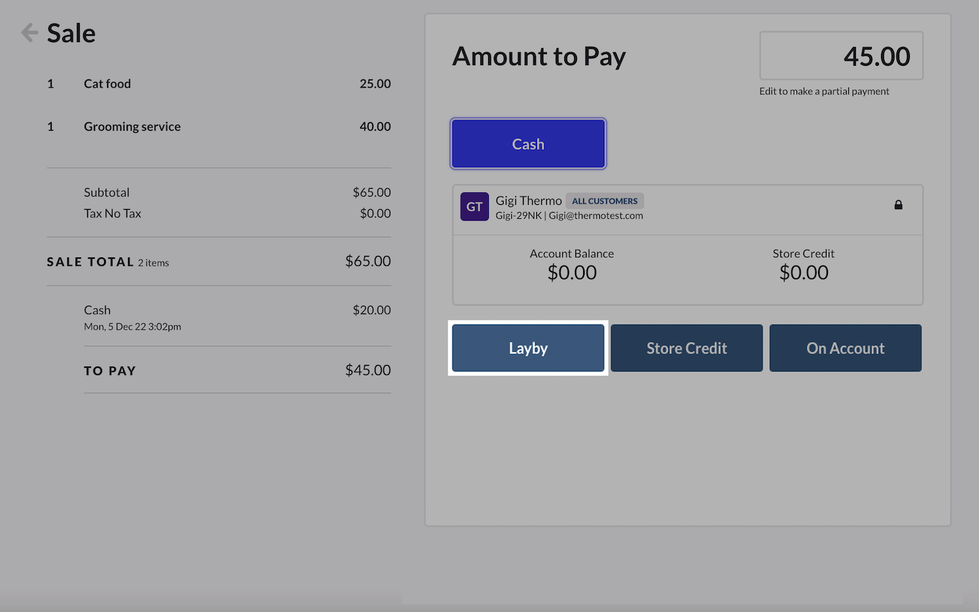 Page de paiement avec un paiement partiel effectué. Le bouton Layaway (mise de côté) est mis en évidence.