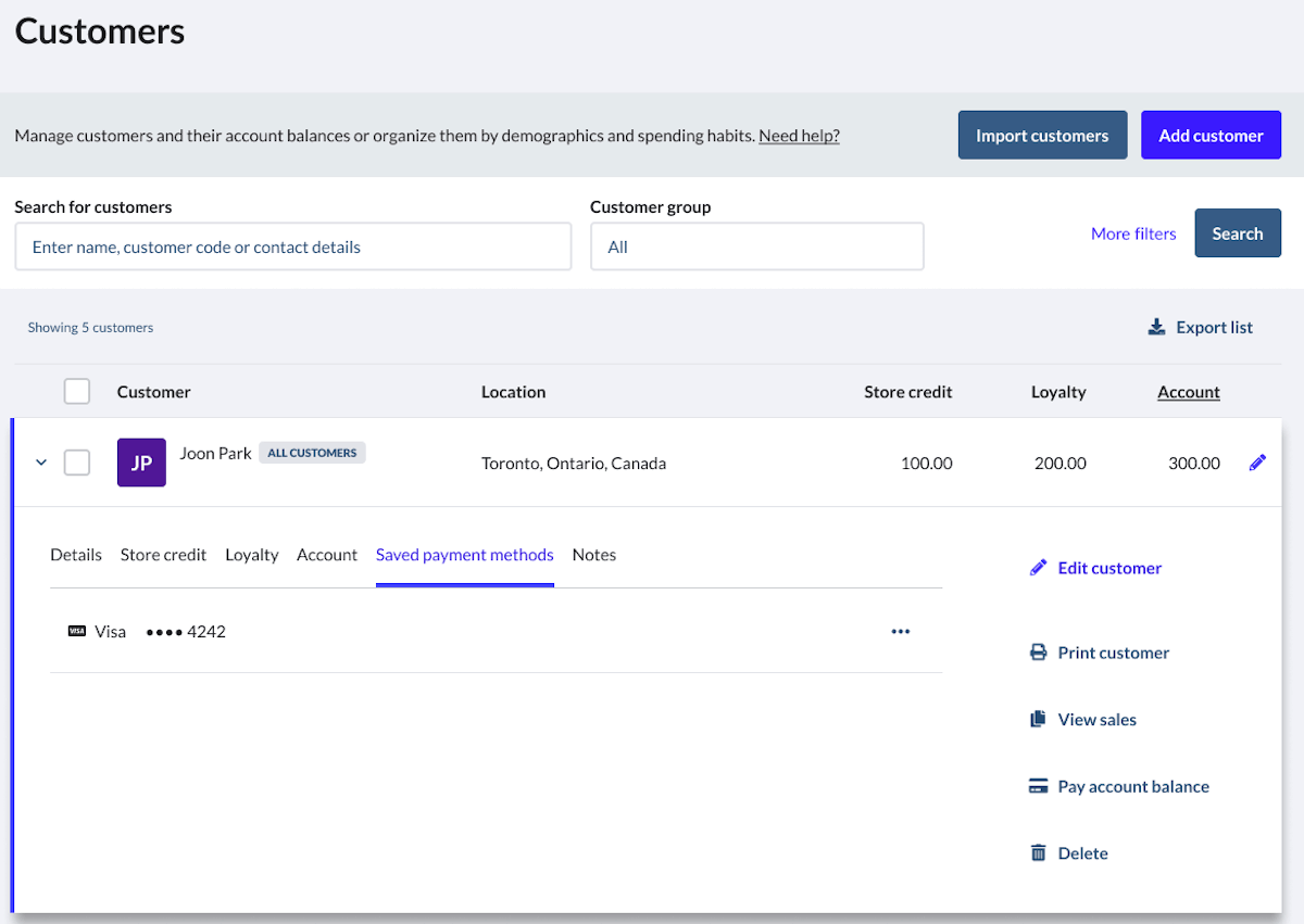 Customer profile page with saved card information.